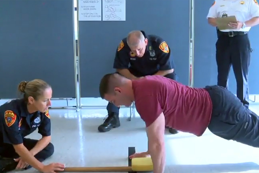 a person taking the police physical fitness screening test